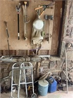 Yard implements, metal bucket, fishnets hanging