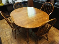 Maple table and four chairs, two with arms, by