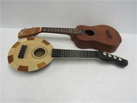 2 Ukuleles, 1 needs strings