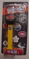 PEZ NHL Calgary Flames ice hockey puck, sealed