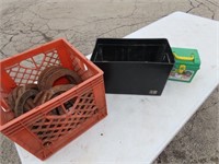 Milk crate of Horse shoes, battery box, stencils.