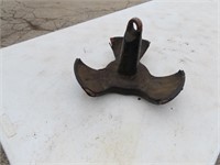 Coated cast iron anchor.