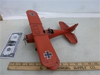 Old Red Metal Baron Airplane