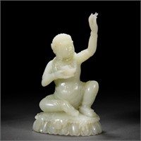 A CHINESE CARVED WHITE JADE INDIAN ADEPT