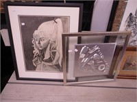 Two framed pieces: a foil print of butterfly