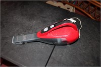 Hand vacuum with charger