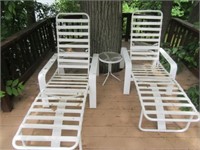 (2) Patio Loungers with Small Glass Top Table.