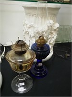 Two early American pressed glass oil lamps,