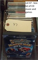 box of music CDs and games