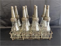 8- 1 quart glass oil bottles & wire carrier