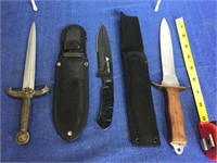2 knives with sheaths.  Small sword