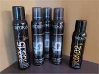 5 unused cans of Redken products- finishing spray