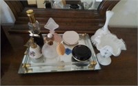 Perfume bottles & table mirror