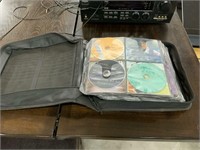 Large carrying case of CDs mostly country music