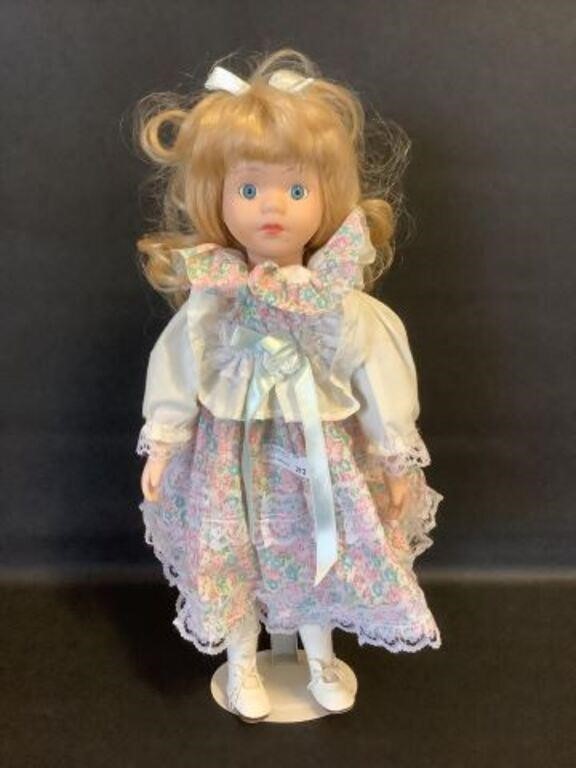 Porcelain Doll with stand 17"h