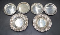 Set four Elizabeth II sterling silver small dishes