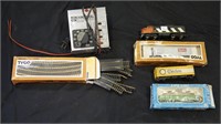 Various HO scale train accessories.