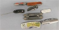 8 various pocket knives