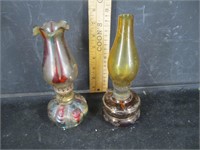 2 small oil lamps