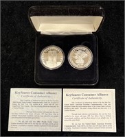 Two .999 Fine Silver Clad Commemorative Coins