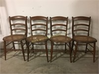 4 old wooden chairs with cane seats
