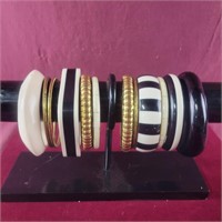 Group of Black, White and gold Colored Bangle