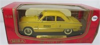 Diecast Myra 1/18 scale 1949 Ford Taxi in box.