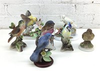 7 assorted porcelain and bisque bird figurines