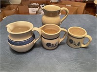 3 stoneware pitchers (one handle cracked), and