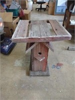 Rustic wooden table with birdhouse bottom approx
