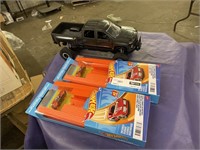 1 LOT (1) BLACK TRUCK TOY, AND (2) HOTWHEELS