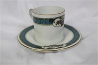 A Dematesse Cup and Saucer
