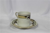 A Dematesse Cup and Saucer