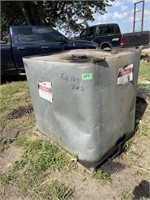 2 Used Oil Totes; 1 Full; 1 close to Empty