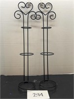 Two iron hanging planter holders