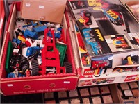 Five boxes of LEGOs; three boxes are original