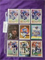 A SLEEVE OF 9 BARRY SANDERS TRADING CARDS