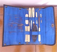 Antique celluloid manicure set in leather pouch -