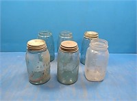 Flat of 5 blue ball jars and 1 atlas Mason jar
