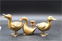 TRIO OF BRASS DUCK FIGURES AND CANDLESTICK HOLDER
