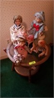 RATTAN SIDE TABLE WITH DOLLS