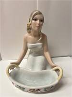 1973 PORCELAIN WOMAN WITH STATUE