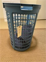 Laundry basket with two bath rugs