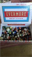Cigar box of marbles, at least 8 shooters.
