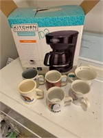 Brand new coffee pot & 6 mugs