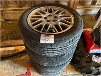 Set of Subaru rims and tires