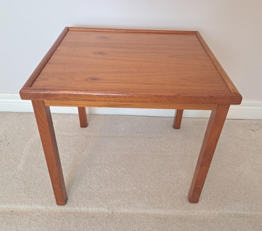 Petite wooden side table.