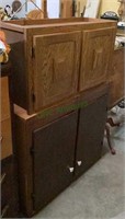 Two separate wood storage cabinets - both with