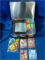 Pokemon tin with handle. Cards and binder