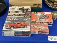 FOUR MODELS, NEW IN BOXES